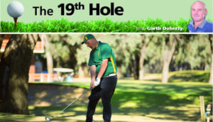 Golfers hold their place