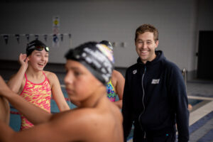 Games medallist on pool deck