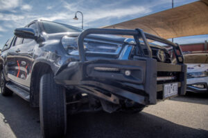 Man held after police car rammed