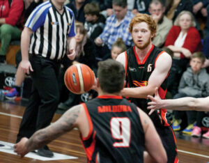 Henry leads men into third