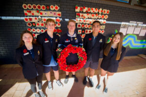 School remembers Anzacs with poppy wall art project