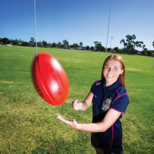 Women running with the ball