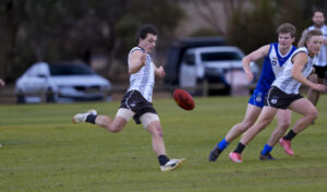 Pies use 100 year game to drag Roos back to reality