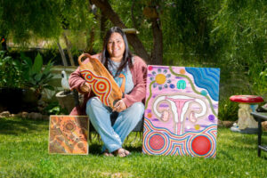 Elisha uses her art to start a positive conversation