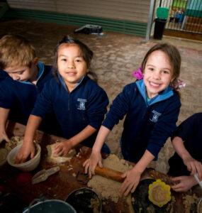 Mildura West students cook up a mess in their new mud kitchen