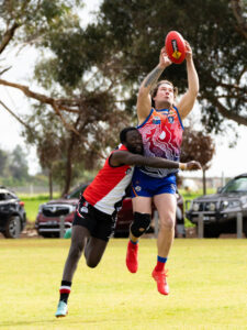 Coates, Redpath nail Saints win