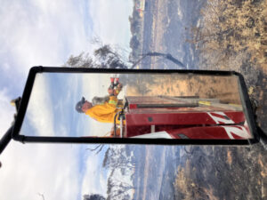 Fire jumps highway, hits crops