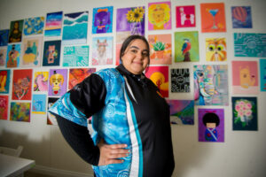 Artist Milla Morgan unveils her T-shirt design for NAIDOC Week