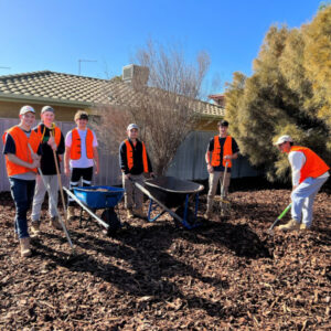 Students get their hands dirty for community