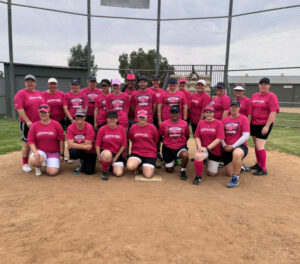 Softballers pitch in for breast cancer
