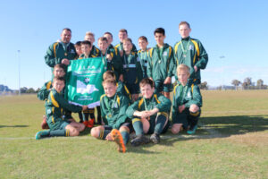 Soccer kids kick on