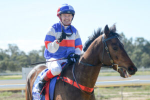 LAST LAUGH: Injured jockey back in winners’ circle