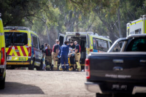 Two racers recovering after boat overturns