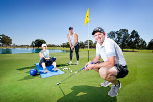 Women teeing off