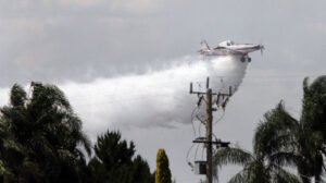 Home lost but firies halt threat