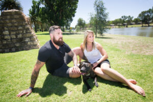 Man’s best friend a paw to lean on