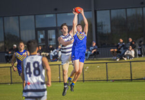 Tall teen grows as defender