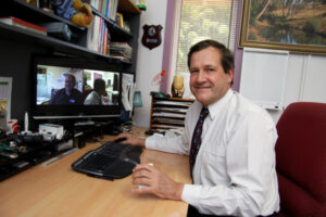 Flu adds to doctor strain: Patients waiting up to a week as GPs work without break