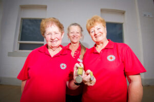 Red Cross trio honoured for fire support