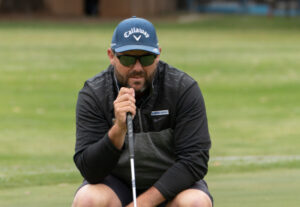 McPhee off to good start in rain