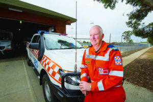 Behind the orange jumpsuit