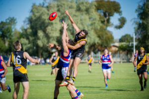 Roos rise above spirited Tigers