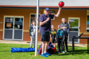 Students get a kick out of footy day