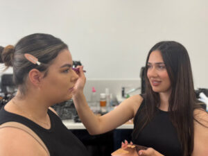 Makeup artist contours fashion week