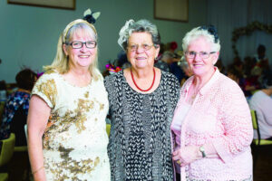Good times on Oaks Day: Ladies dress up for charity