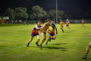 Gritty Lions hold off Hawks