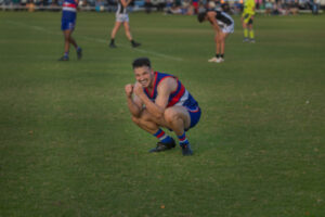 Roos hold on in torrid finish
