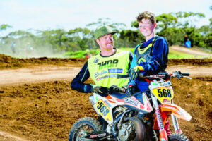 Lachlan Metcalf shines on a bike