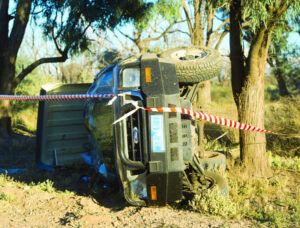 Woman walks from wreck