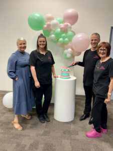 Doctors deliver birth days cake