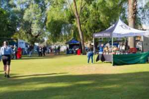 Market goers brave weather and restrictions