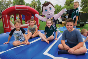 Auskick kids having a ball
