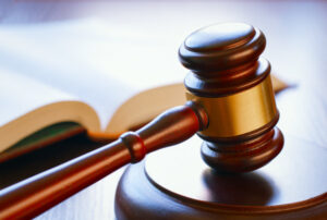 Fraudster spends night in jail after order breach