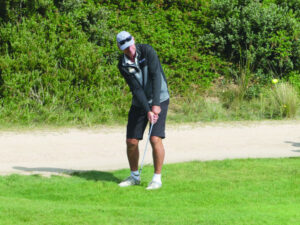 Rhodes makes winning run at title