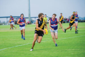 Hancock learns plenty in coaching debut
