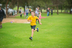 Cross-country kids dodge rain