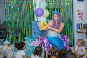 Mermaid swims into Midway for story time