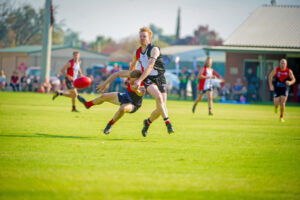 Thomson kicks a bag