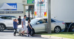 Car wedged in Deakin Avenue smash