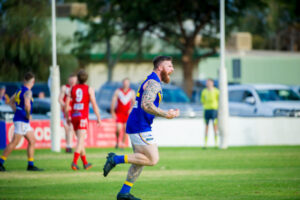 FOOTY FIX – Swallows soar, Magpies march on