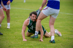 Imps show fight, but Roos prevail