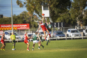 Fifteen changes, but Imps prevail