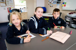 Sacred Heart students happy to be back with their buddies