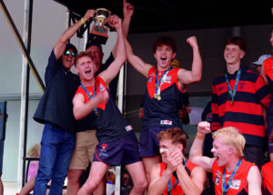 Dees, Dogs and Eagles all claim junior flags