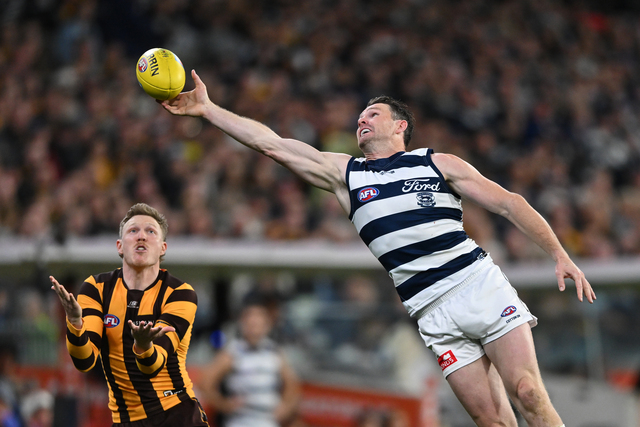 Cats claw past Hawks