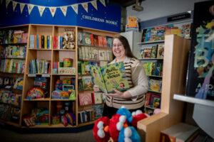 Local author emerges from behind the pen